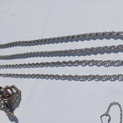 Silver toned earrings, necklaces, pendants and more - all silver in color