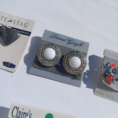 Silver toned earrings, necklaces, pendants and more - all silver in color