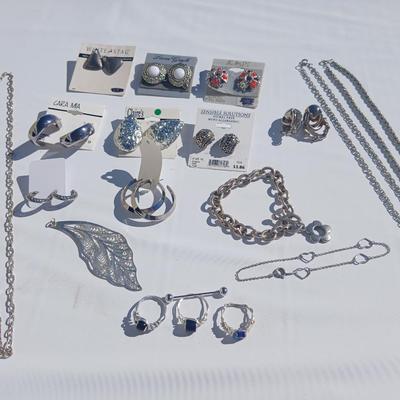 Silver toned earrings, necklaces, pendants and more - all silver in color