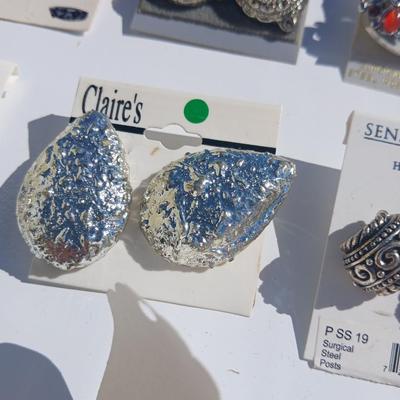 Silver toned earrings, necklaces, pendants and more - all silver in color