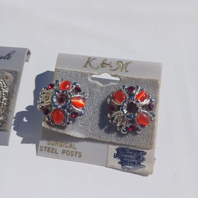 Silver toned earrings, necklaces, pendants and more - all silver in color