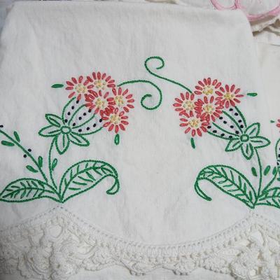 Vintage embroidered standard pillowcases - all have a pair except one