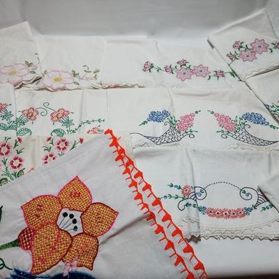 Vintage embroidered standard pillowcases - all have a pair except one