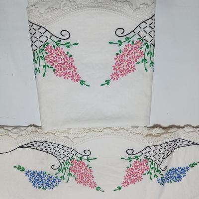 Vintage embroidered standard pillowcases - all have a pair except one