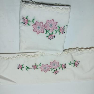 Vintage embroidered standard pillowcases - all have a pair except one