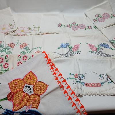 Vintage embroidered standard pillowcases - all have a pair except one