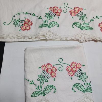 Vintage embroidered standard pillowcases - all have a pair except one