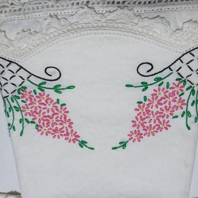 Vintage embroidered standard pillowcases - all have a pair except one