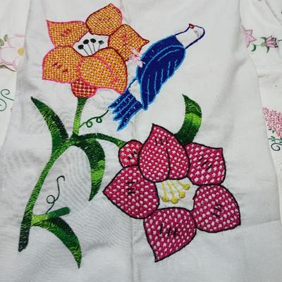Vintage embroidered standard pillowcases - all have a pair except one