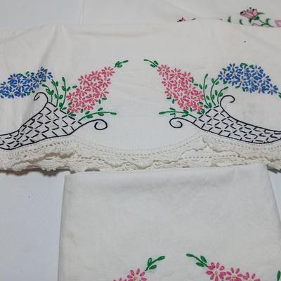 Vintage embroidered standard pillowcases - all have a pair except one