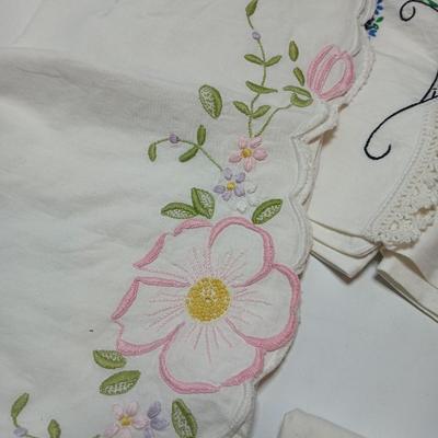 Vintage embroidered standard pillowcases - all have a pair except one