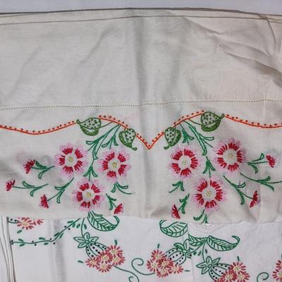 Vintage embroidered standard pillowcases - all have a pair except one