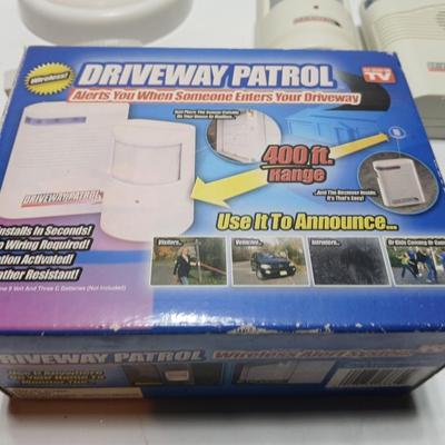 Brand new Driveway patrol alarm system with several push lights, and a nightlight