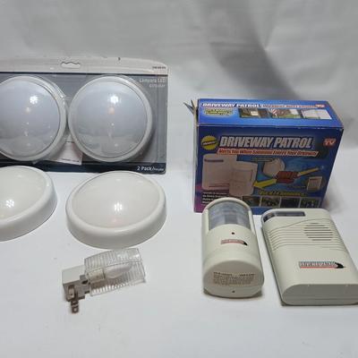 Brand new Driveway patrol alarm system with several push lights, and a nightlight