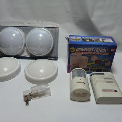 Brand new Driveway patrol alarm system with several push lights, and a nightlight
