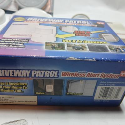 Brand new Driveway patrol alarm system with several push lights, and a nightlight