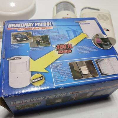 Brand new Driveway patrol alarm system with several push lights, and a nightlight