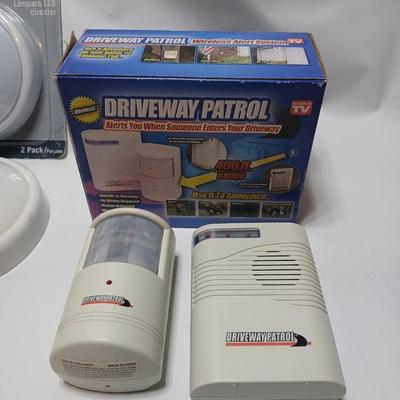 Brand new Driveway patrol alarm system with several push lights, and a nightlight