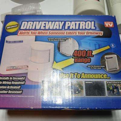Brand new Driveway patrol alarm system with several push lights, and a nightlight