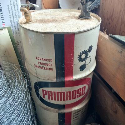 Steel Primrose oil company chemical barrel with vintage cast iron Syracuse Syraco valve spigot / Faucet