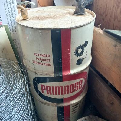 Steel Primrose oil company chemical barrel with vintage cast iron Syracuse Syraco valve spigot / Faucet