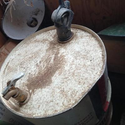 Steel Primrose oil company chemical barrel with vintage cast iron Syracuse Syraco valve spigot / Faucet