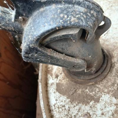 Steel Primrose oil company chemical barrel with vintage cast iron Syracuse Syraco valve spigot / Faucet