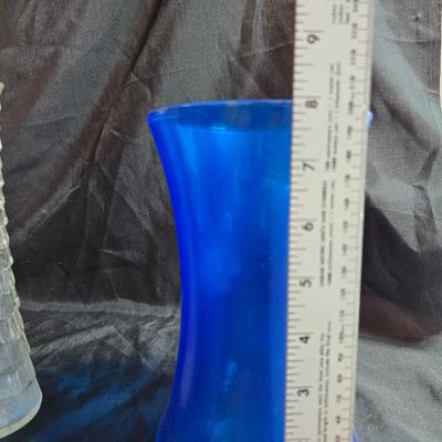 Variety of neat Colored glass vases, jar and bottles