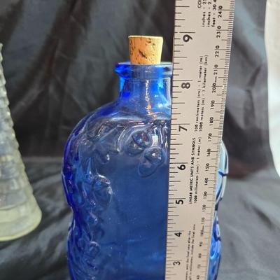 Variety of neat Colored glass vases, jar and bottles