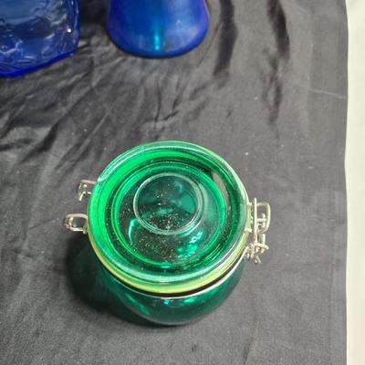 Variety of neat Colored glass vases, jar and bottles