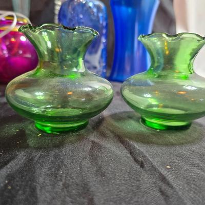 Variety of neat Colored glass vases, jar and bottles