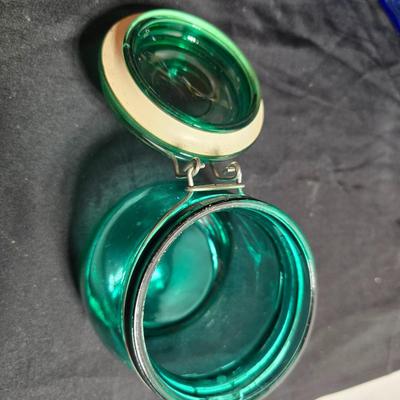 Variety of neat Colored glass vases, jar and bottles