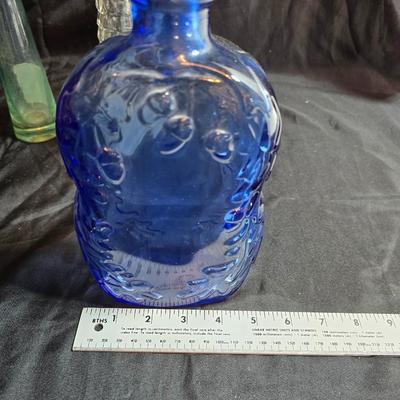 Variety of neat Colored glass vases, jar and bottles