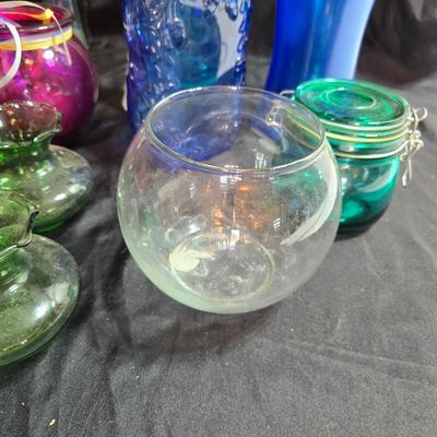Variety of neat Colored glass vases, jar and bottles