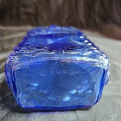 Variety of neat Colored glass vases, jar and bottles