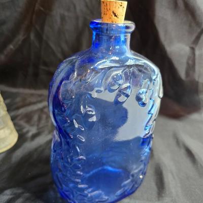 Variety of neat Colored glass vases, jar and bottles