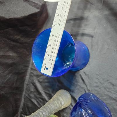 Variety of neat Colored glass vases, jar and bottles