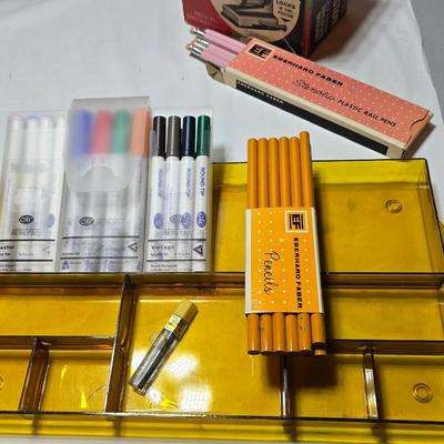 Office items - tape dispenser - old pencil sharpeners - brief case - files - folders- markers and more