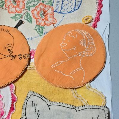 Assortment of embroidered cloth - flowers, cats and other cute patterns