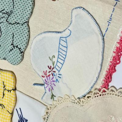 Assortment of embroidered cloth - flowers, cats and other cute patterns