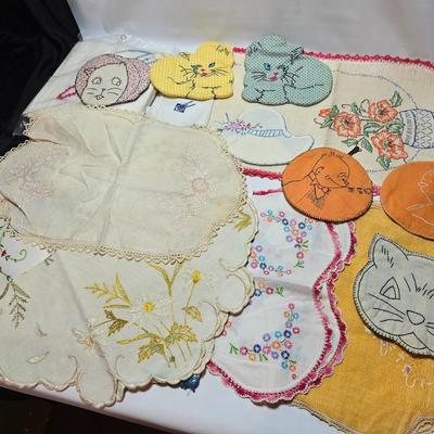 Assortment of embroidered cloth - flowers, cats and other cute patterns