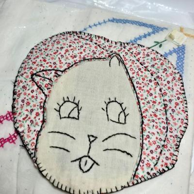 Assortment of embroidered cloth - flowers, cats and other cute patterns