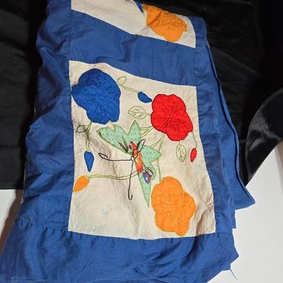 Two handmade quilted fabric pieces -