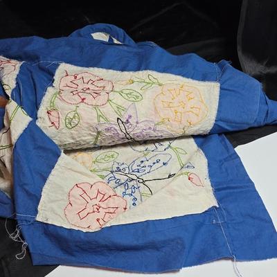 Two handmade quilted fabric pieces -