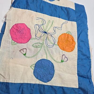 Two handmade quilted fabric pieces -