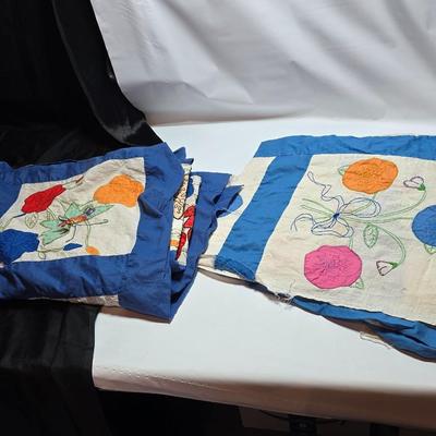 Two handmade quilted fabric pieces -