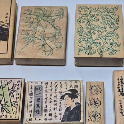 Stamps mounted on wood blocks - mostly Asian themed - bamboo - letters- and more