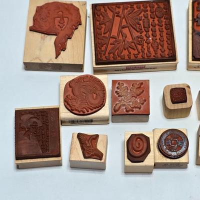 Stamps mounted on wood blocks - mostly Asian themed - bamboo - letters- and more