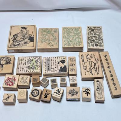 Stamps mounted on wood blocks - mostly Asian themed - bamboo - letters- and more