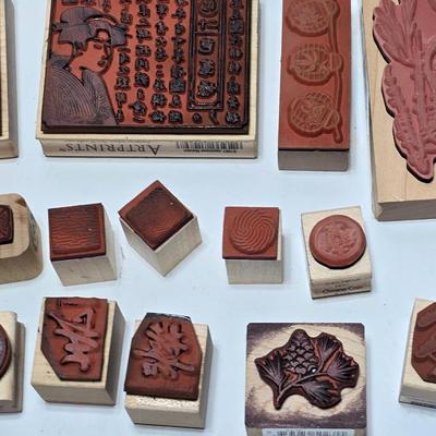 Stamps mounted on wood blocks - mostly Asian themed - bamboo - letters- and more